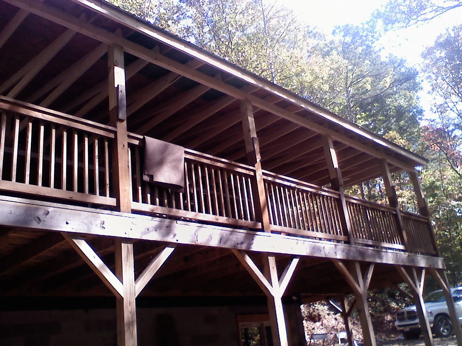Timber framing under a new elevated porch and deck — Roof Leak Repair in Los Altos by Roofing Brothers